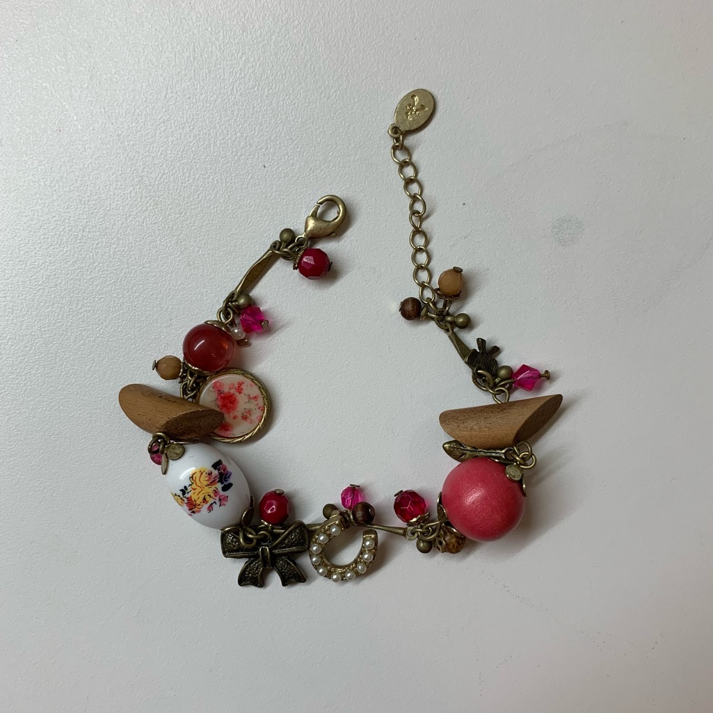 Accessorize Pink Charm Bracelet With Floral Beads, Horseshoe And Bow Charm